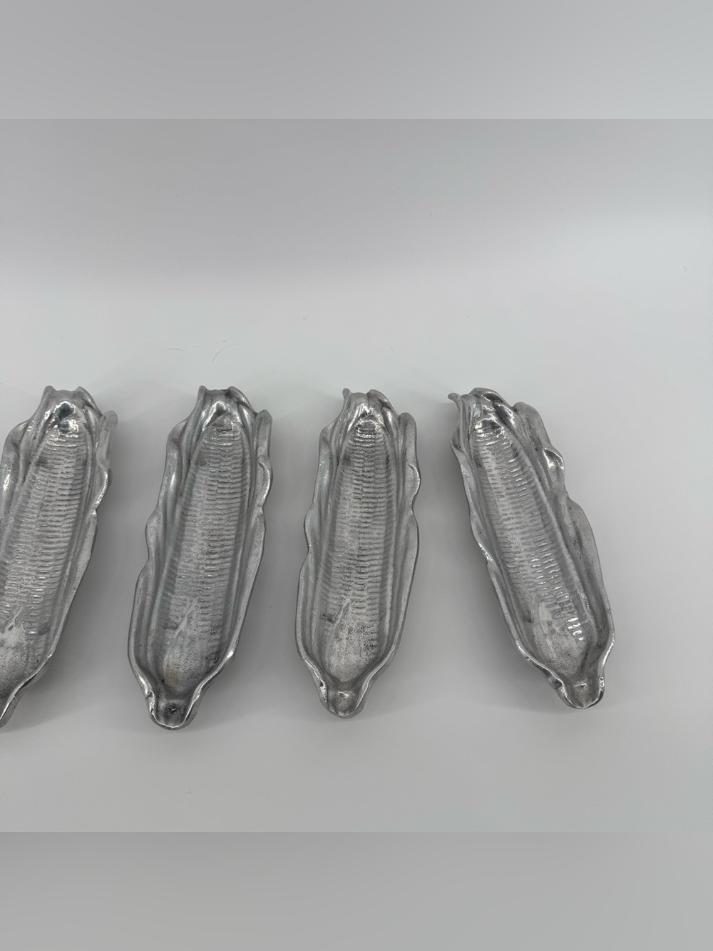 Set of 4 Silver Corn-on-the-cob serving dishes